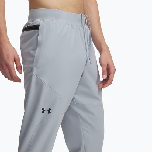 Pánské tréninkové kalhoty Under Armour Unstoppable Tapered harbor blue/black