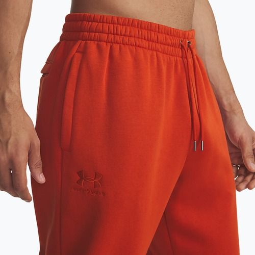 Pánské tréninkové kalhoty Under Armour Essential Fleece Joggers surplus orange/surplus orange