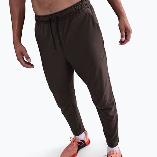 Pánské kalhoty Nike Unlimited baroque brown/black/baroque brown