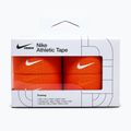 Elastický kohezivní obvaz Nike Strenght Athletic Tape 4 ks. oranžová/bílá 4