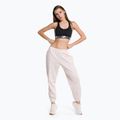 Dámské tréninkové kalhoty New Balance Athletics Nature State French Terry pink WP23553WAN 2