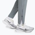 Pánské běžecké kalhoty Nike Stride Dri-Fit Woven smoke grey 6