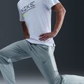 Pánské běžecké kalhoty Nike Challenger Therma-Fit Winterized light smoke grey 6