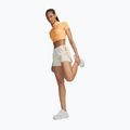 Dámské běžecké šortky Under Armour Velociti Pro 4" 2N1 Shorts stone/reflective 2