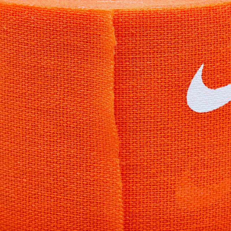 Elastický kohezivní obvaz Nike Strenght Athletic Tape 4 ks. oranžová/bílá 13