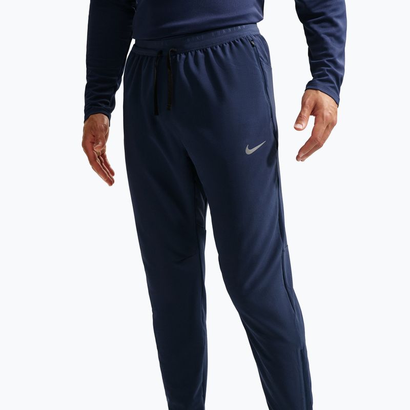 Pánské běžecké kalhoty Nike Stride Dri-Fit Woven midnight navy