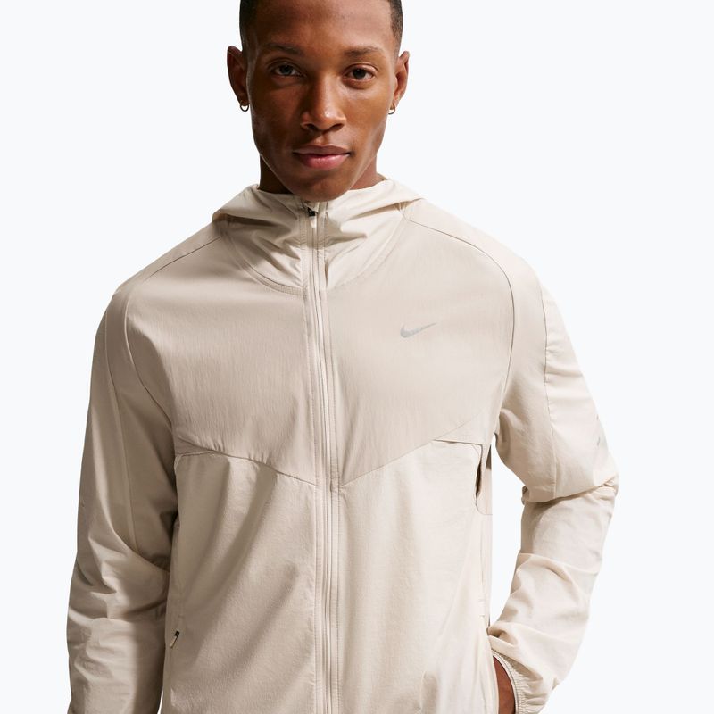 Pánská běžecká bunda Nike Stride Dri-Fit cream II/birch/natural 4