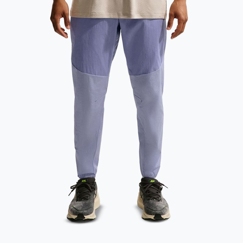 Pánské běžecké kalhoty Nike Stride Repel Woven iron purple/indigo haze