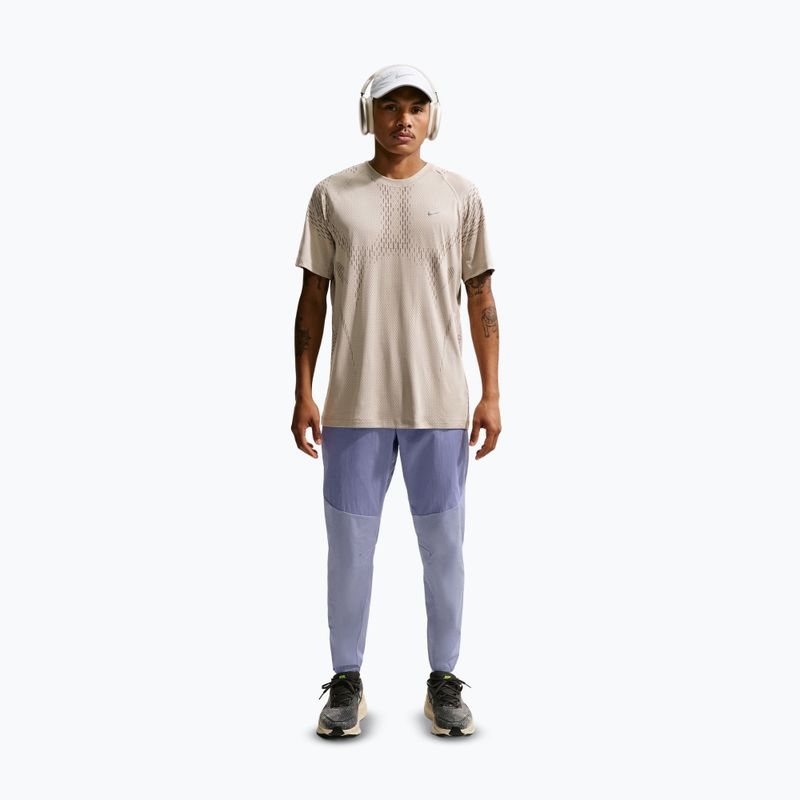 Pánské běžecké kalhoty Nike Stride Repel Woven iron purple/indigo haze 2