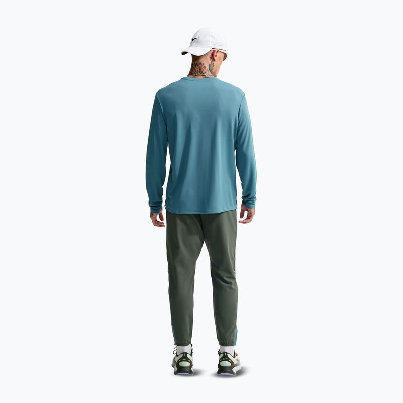 Pánské běžecké kalhoty Nike Miler Dri-Fit Woven camo green/mineral slate 3