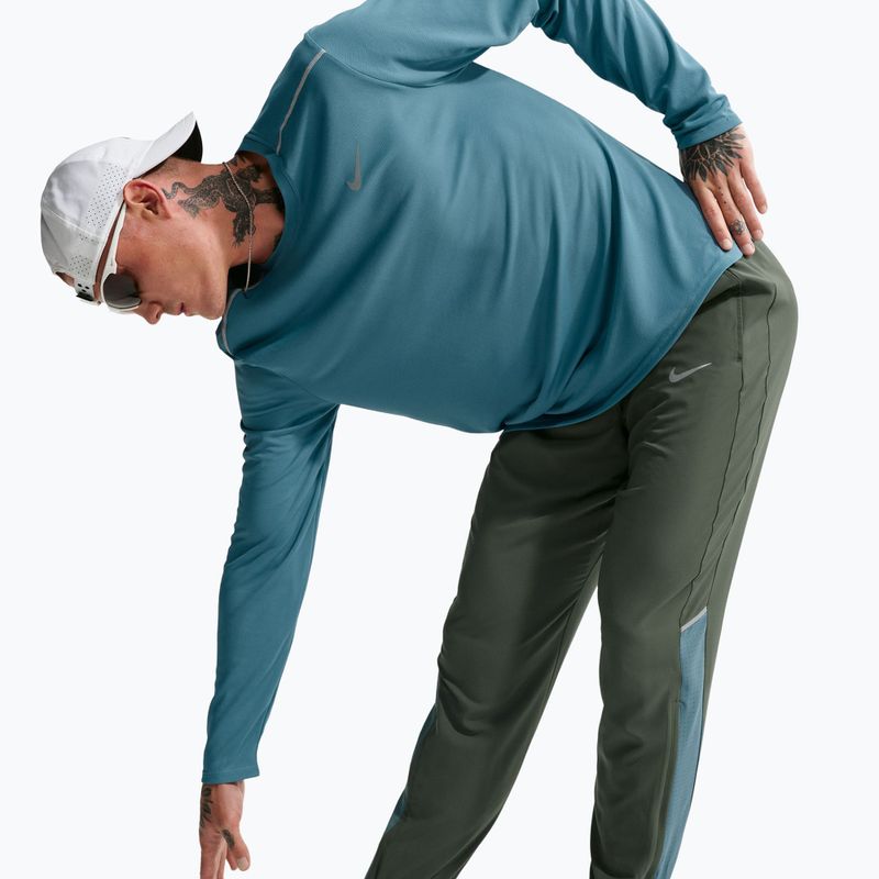 Pánské běžecké kalhoty Nike Miler Dri-Fit Woven camo green/mineral slate 6