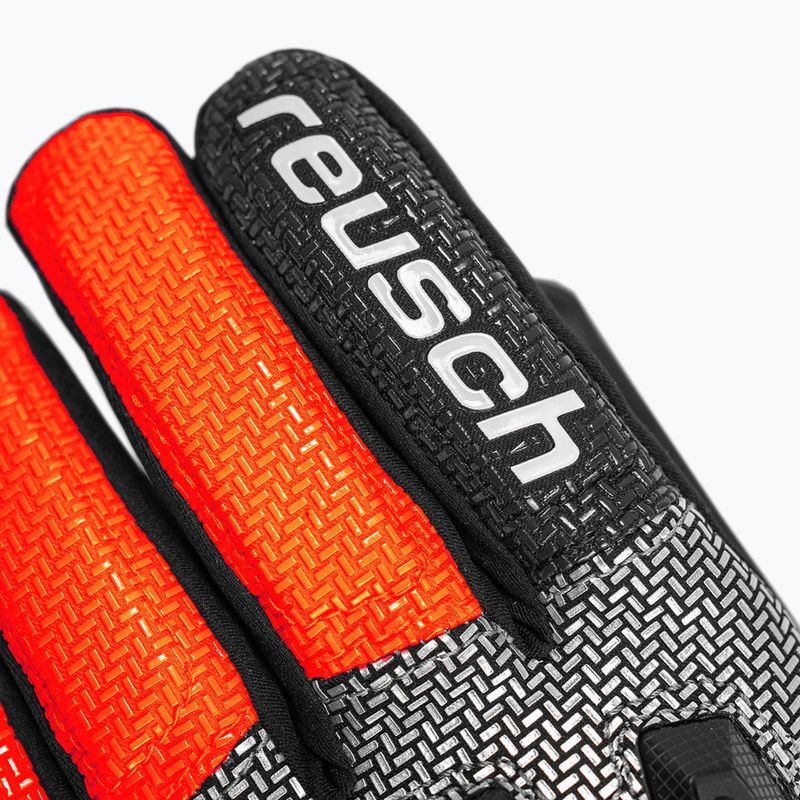 Dětské lyžařské rukavice Reusch Worldcup Warrior R-Tex XT Junior black/silver/fluo red 5