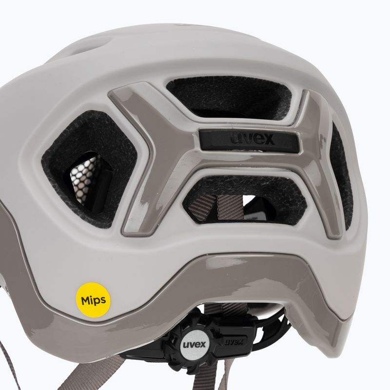 Cyklistická helma UVEX React MIPS warm grey matt 7