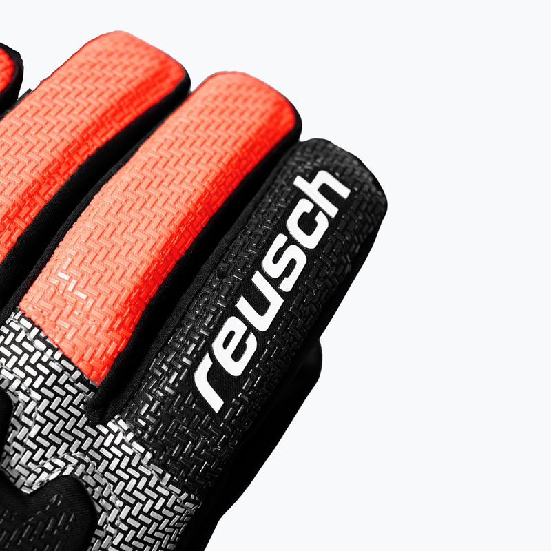 Dětské lyžařské rukavice Reusch Worldcup Warrior Prime R-Tex XT black/silver/fluorescent red 7